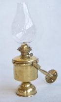 Attractive vintage brass ships wall mounted light with single plane gimble. Burner wick adjustment