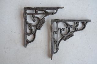 Two cast iron vintage luggage rack supports, H12.5xD12.5cm