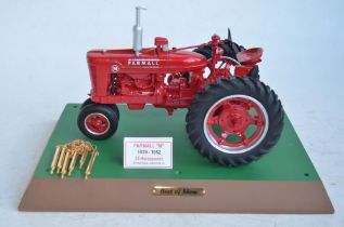 Speccast 1/16 scale resin and metal International Harvester Farmall "M" tractor model with base