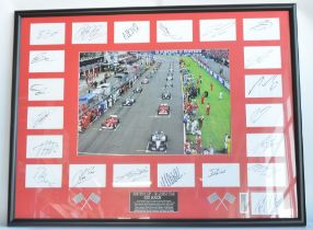 Large framed collection of 21 Formula 1 drivers autographs from The British Grand Prix,