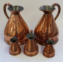 Set of 5 copper measures consisting of x2 Gallon jugs, 1 Pint jug and x2 1/2 Pint jugs, made by Burt