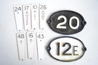 Two cast iron railway/canal bridge plates and 7 railway signal lever plates.