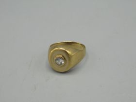 9ct yellow gold signet ring, the oval face set with clear stone, size U1/2, stamped 375, 9.0g