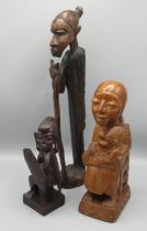 Carved wood Iban warrior from Borneo, carved wood Madonna and Child from Nigeria & a carved wood