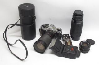 Canon AE-1 Program 35mm camera serial no. 1375093 with FD 50mm 1:1.8 lens, Sirus Auto Zoom 1: 4.0-