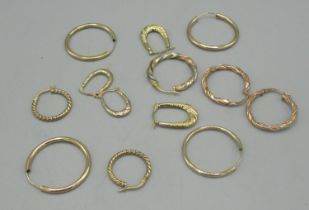 Four pairs of 9ct gold hoop earrings in various styles and designs, and one sing multi tone 9ct gold