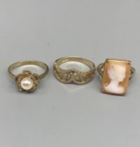 9ct yellow gold ring set with single pearl, size O, a 9ct gold cameo ring, size L, and another 9ct