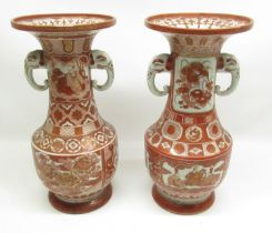 Pair of C20th Kutani vases with Elephant head handles, overall burnt orange decoration, character