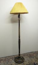 C20th black Chinoiserie decorated standard lamp, on circular base and bun feet, pleated shade (A/F)