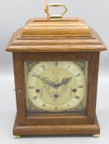 Franz Hermle retailed by Comitti London - C20th oak Georgian style bracket clock with caddy top