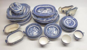 Collection of blue and white pottery inc. plates, lidded tureen, cream jugs, cups, saucers, etc.