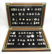 Collection of framed reproduction military cap badges inc. Green Howards, Gurkhas, S.A.S., Medical