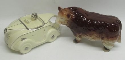 Sadler Regd. No. 320236 cream car teapot and a Beswick style model of a cow (2)