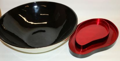 Large Chinese lacquer style circular bowl with black interior, D60cm and a graduated pair of similar