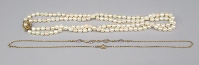 Double row pearl necklace, with 9ct yellow gold flower head clasp, L41cm, stamped 9ct, and a 9ct