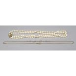 Double row pearl necklace, with 9ct yellow gold flower head clasp, L41cm, stamped 9ct, and a 9ct