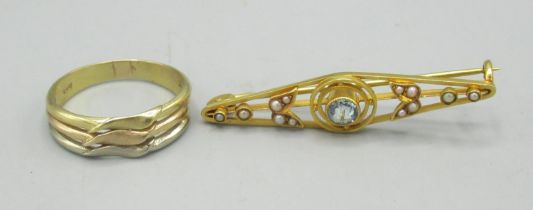 15ct yellow gold bar brooch set with central aquamarine and seed pearls, stamped 15, and a multi