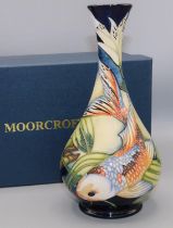 Moorcroft Pottery: Quiet Waters pattern vase decorated with koi carp, dated 2002, H23cm, with box