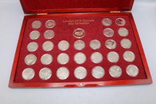 London 2012 Olympic 50p Collection (30), in plastic capsules and display case, majority from
