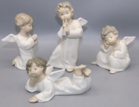 Four Lladro porcelain figures of winged cherubs in various poses (4)