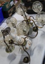 Dutch brass and ceramic five branch chandelier and a matching three branch chandelier, both with