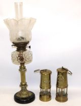Two reproduction miners lamps incl. one marked Eccles Type 6; and a late C19th/early C20th oil lamp,
