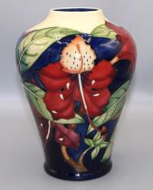 Moorcroft Pottery: Simeon pattern vase, designed by Philip Gibson, dated '99, H22cm