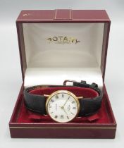 Rotary gold quartz wristwatch with date, signed white Roman dial with centre seconds, two piece case