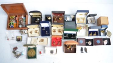 Collection of cuff-links, pin badges, a sterling silver St Christopher necklace by Christopher James