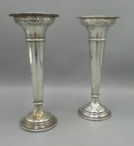 Pair of hallmarked Sterling silver tall vases with galleried rims by Walker & Hall, Sheffield, 1921,