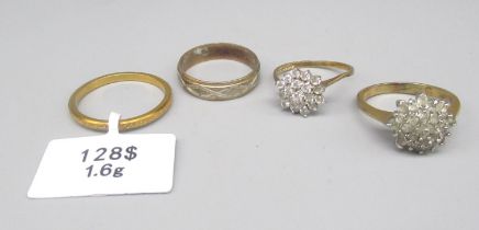 Two 9ct yellow gold cluster rings set with clear stones, a 9ct gold band ring, all stamped 375,