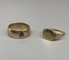 9ct yellow gold band ring set with single ruby, size H, stamped 375, and a 9ct gold signet ring (A/