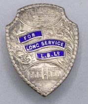 Hallmarked silver shield shaped long service badge