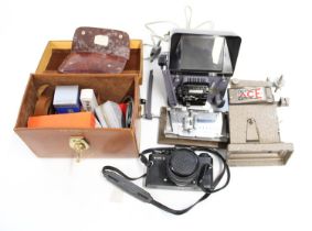 Harmony 8mm Editor/Viewer in original box, Bolex Paillard case of accessories, Rolleiflex SL35 E