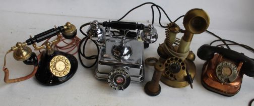 Collection of Telephones in different styles including Onyx and brass candle stick phone, copper and