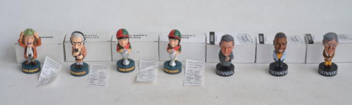 3x Guinness Pocket Pundit and 4 John Smith's speaking figurine caricatures, all boxed. (7)