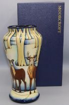 Moorcroft Pottery: Wild Highlanders pattern vase, designed by Sandra Dance, decorated with deer in