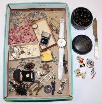 Collection of costume jewellery inc. celluloid brooches, and a silver bladed butter knife with