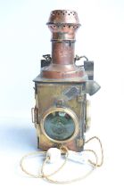 An attractive vintage railway level crossing gate lamp (possibly French) in brass and copper with