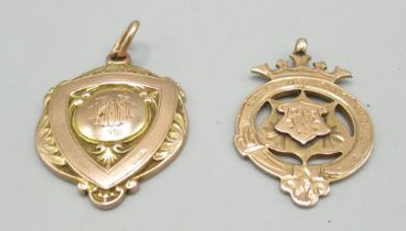 Two early C20th rose gold fobs dated 1909 and 1919 respectively, hallmarked .375, weight 14.2g
