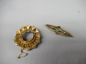 9ct yellow gold bar brooch set with green stone and seed pearls, and another 9ct yellow brooch (