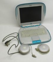 Apple ibook laptop with 2 power adapters and 1 plug