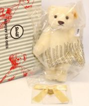 Steiff teddy bear: 'Memories' 664601, white mohair bear with heart shaped tag on cream ribbon,