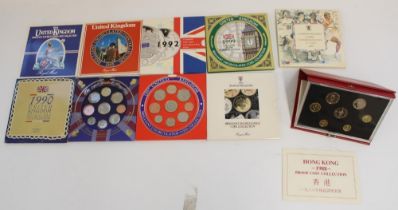 Collection of UK BUNC coin collection date packs, Commonwealth Games £2 pack and a Hong Kong 1988