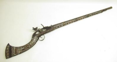 Indo-Persian style flintlock musket with copper barrel rings, inlaid with mother of pearl