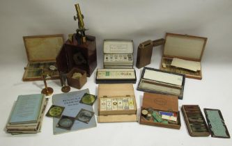 J.T.Slugg of Manchester brass microscope with original wood case and a large collection of late