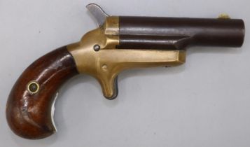 Colt .41 rimfire Derringer pistol, 2 1/2" marked `COLT' further stamps to the frame. L12.5cm overall
