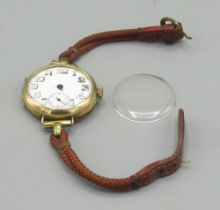 Swiss - gold trench wristwatch, white enamel Arabic dial with skeletonised numerals and subsidiary