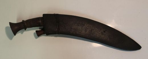 C19th Nepalese Kukri fighting knife with wooden handle in original wood and leather scabbard,