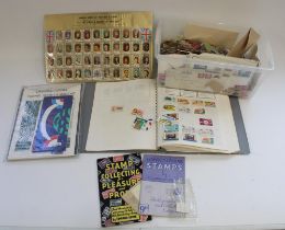 All world partially filled stamp album, Channel tunnel souvenir pack and a box of loose stamps and